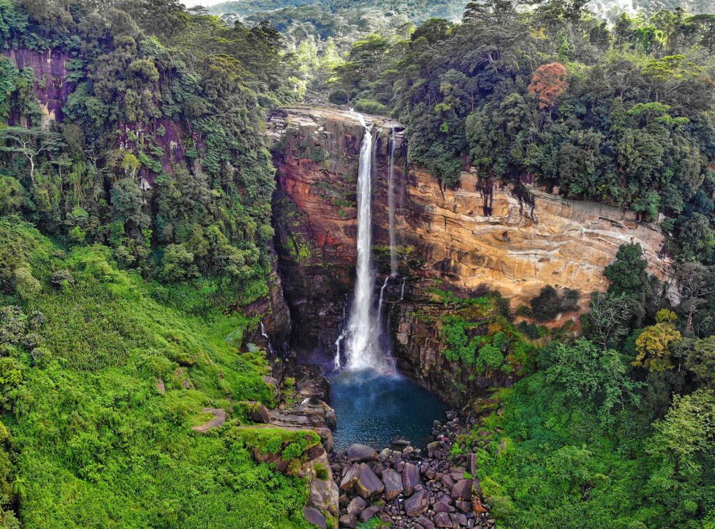 Lakshapana waterfall and its greenery surroundings