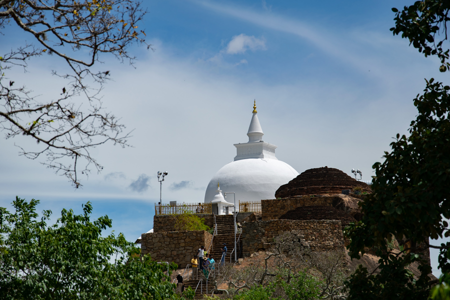 The white stupa of sithulapawwe temple on a rocky stage