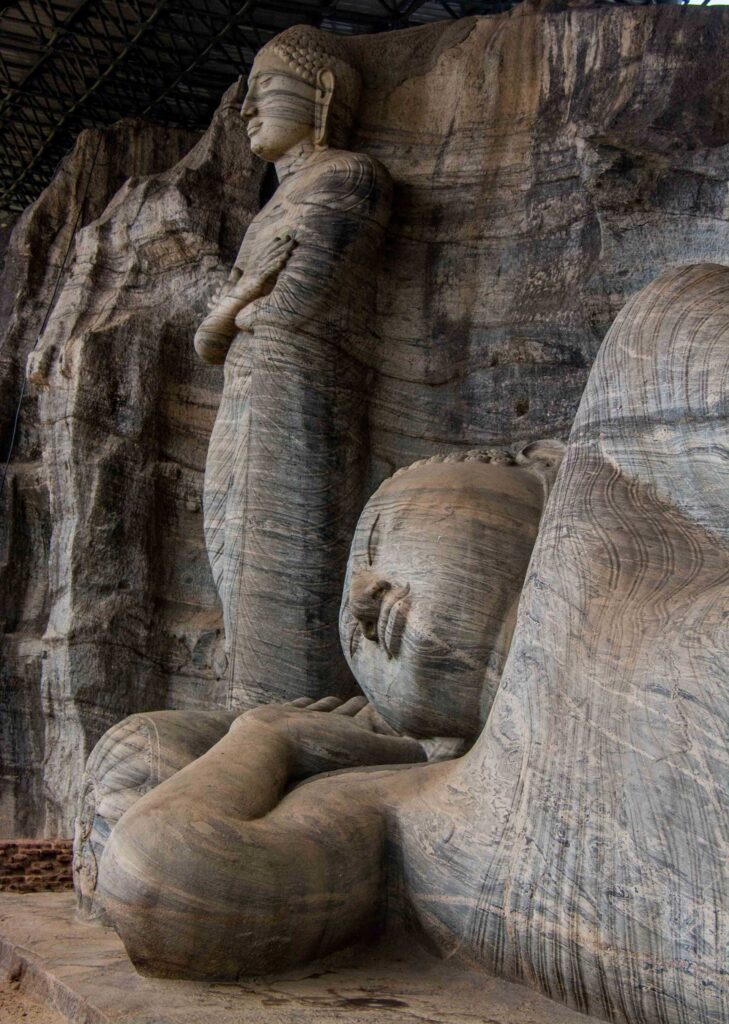 Two stone statues of Lord Buddha
