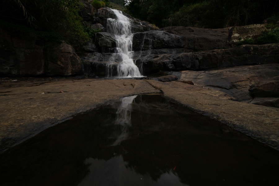 Uduhawara, a waterfall in Sri Lanka pouring down over a rocky terrain