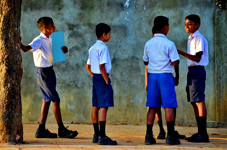 Few boys in school uniform Interacting with Each Other; One of the Best Things about Secondary Education System in Sri Lanka