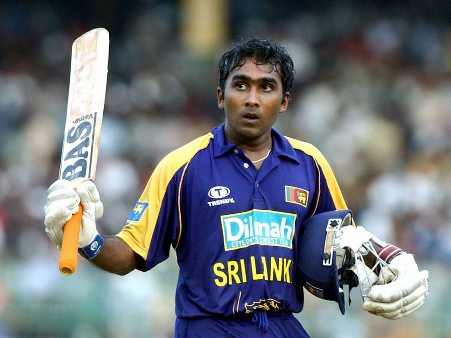 Mahela Jayawardene, Sri Lanka’s Popular Cricketer, with the helmet and the bat in his hands, after a cricket match in the field.