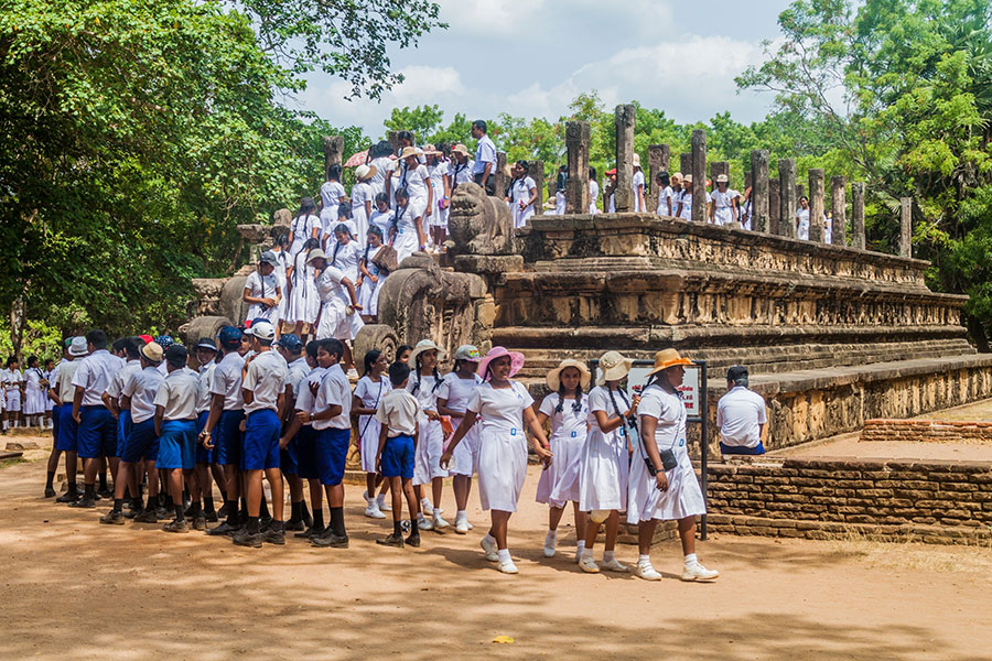School Children in lines Exploring an Ancient City, as a part of the Primary Education in Sri Lanka