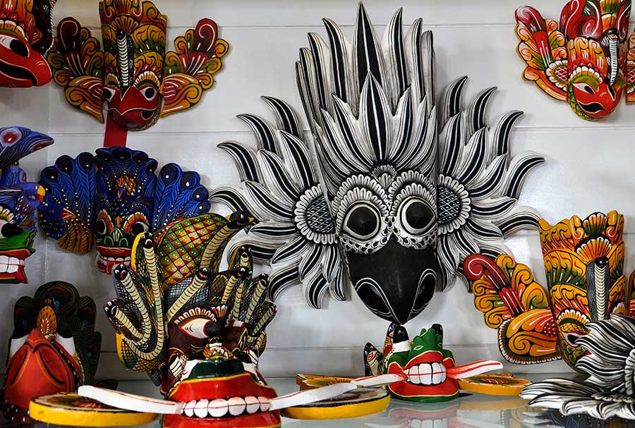 Colourful wooden masks that belong to the traditional mask industry of Sri Lanka
