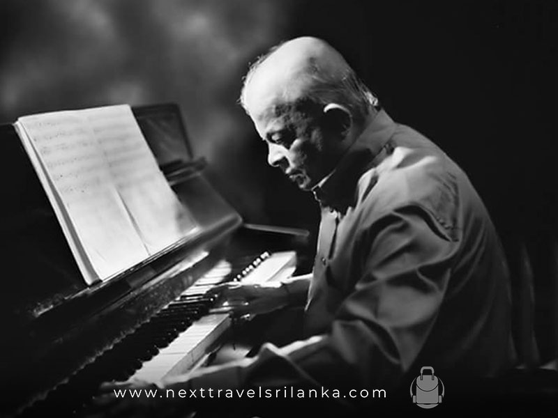 Premasiri Kemadasa, the Great Musician from Sri Lanka, playing a piano