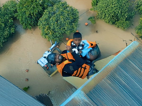 Helicopter airlift operations supporting relief efforts after Cyclone Ditwah in Sri Lanka.