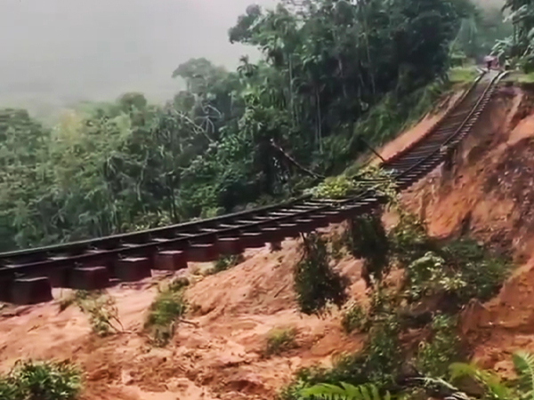 Flooded railway tracks disrupting train services during Cyclone Ditwah.